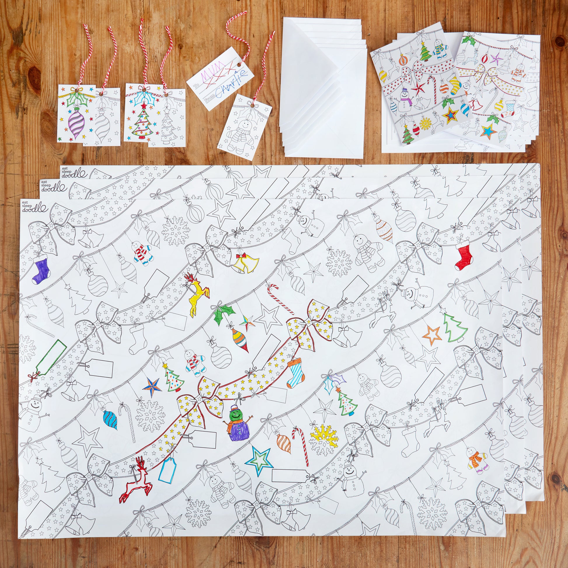 3 x Gift Wrap Paper, sizes 49cm x 71cm, 6 x  Gift Tags, sizes 8.5cm x 5.5cm and 6 x Christmas Cards sizes 14.8cm x 21cm Fabric: paper/card. Pack weight: 190g.. Each item has a festive Christmas design to colour in. 